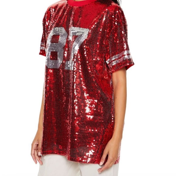 A knit tunic featuring allover sequin embellishments, front number "87" KC - Picture 3 of 6